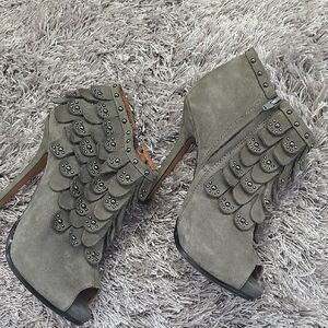 Gray Heeled Boots with Durable Construction and Rugged Sole